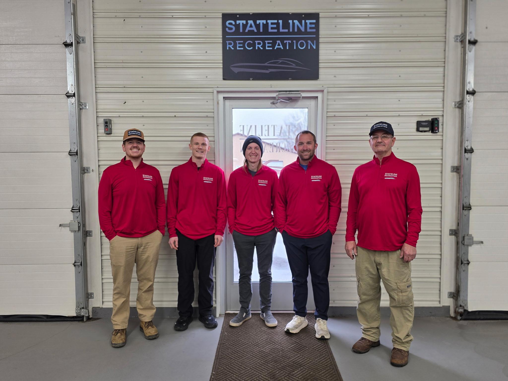 The StateLine Recreation team standing in front of the shop